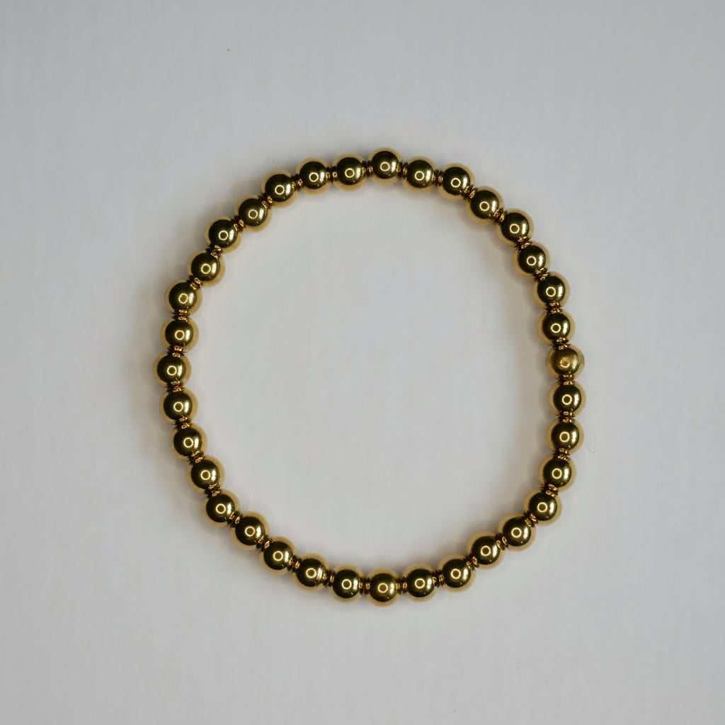 Pulsera Cuentas Doradas