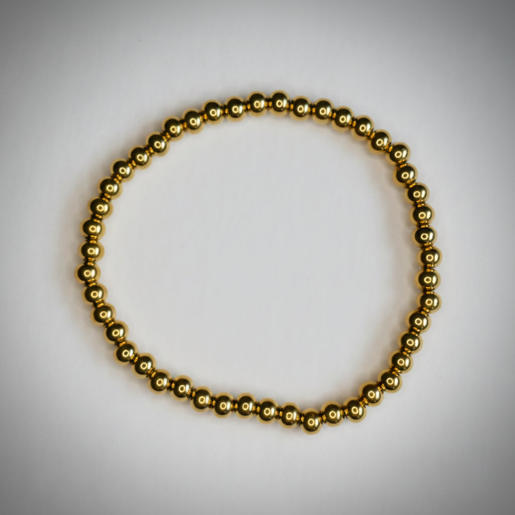 Pulsera Cuentas Doradas